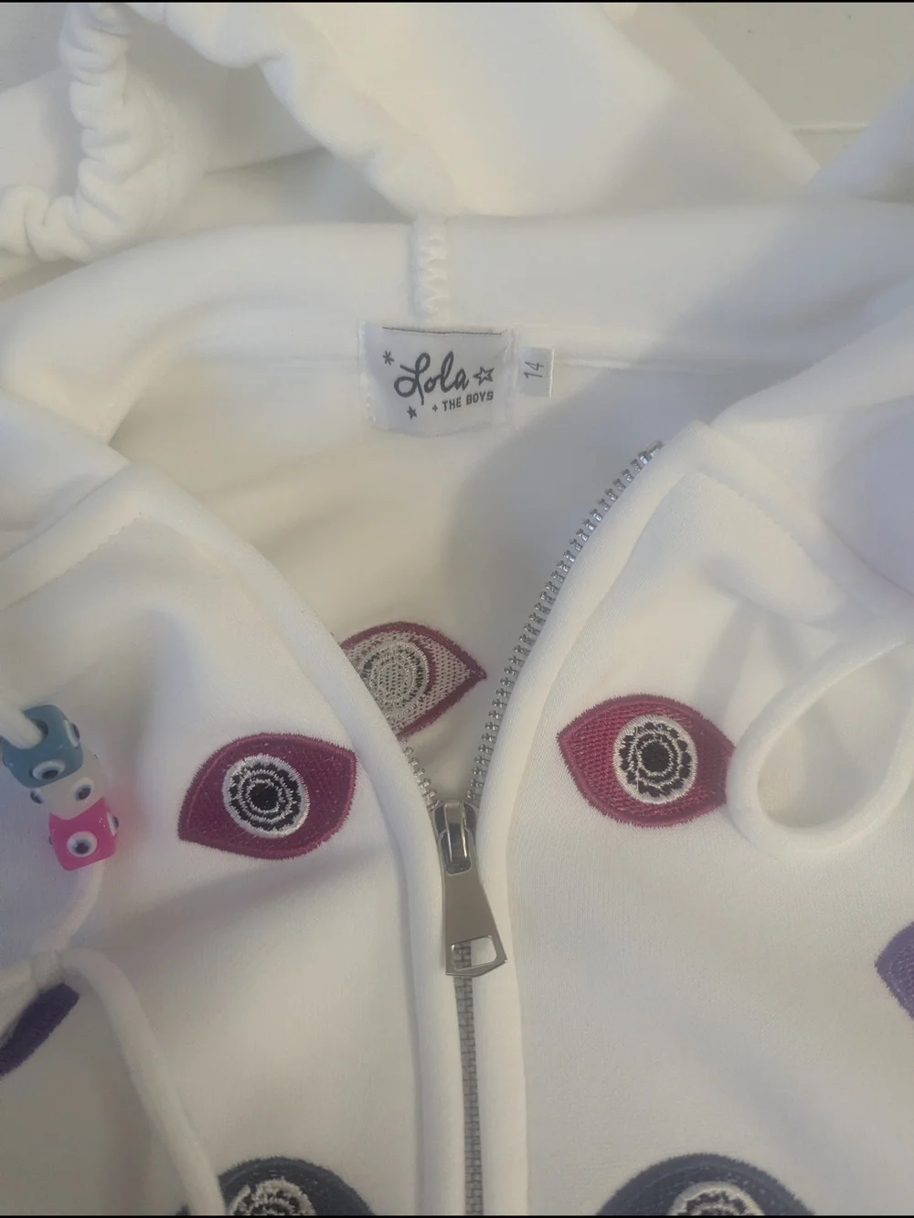 Lola + The Boys White Hoodie with Pink and Purple Eye Embroidery
